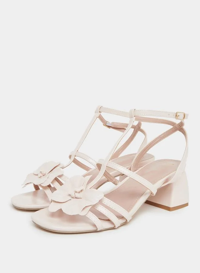 ستايلي صندل كعب برباط كاحل وتفاصيل زهرة